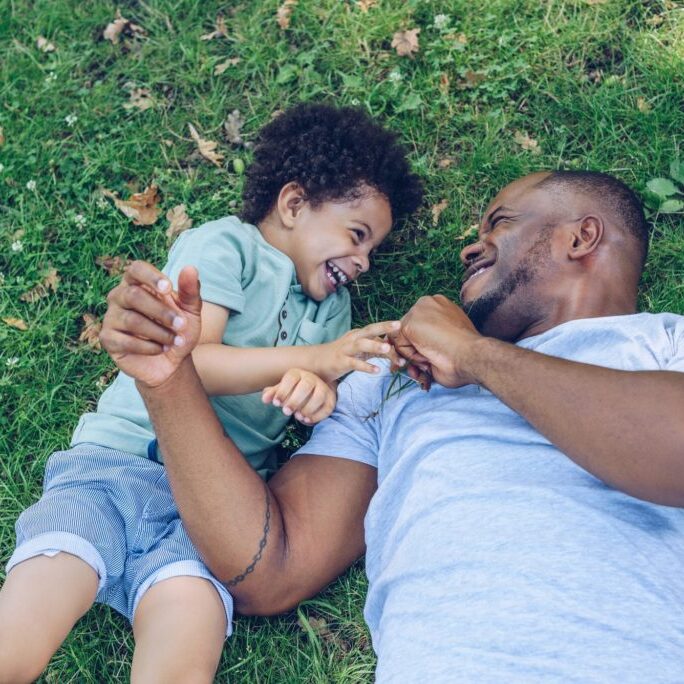 MFFK counseling services man with son in park-min